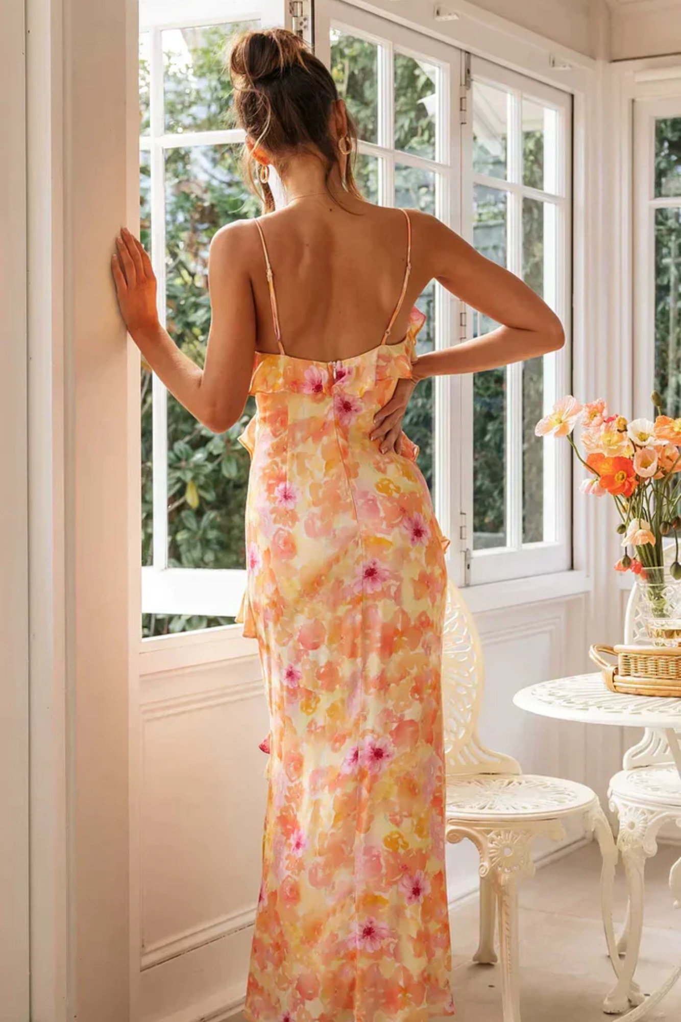 | Sheer floral maxi dress with soft ruffle cascade
