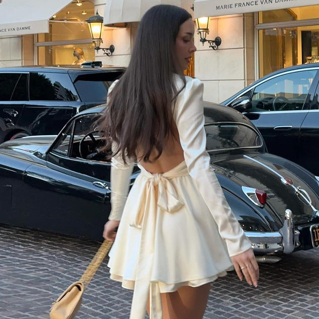 TARUXY Satin Hollow Backless Strappy Long Sleeve Mini Dress For Women Half Turtleneck Sexy Bow Splice Big Hem Party Club Dress