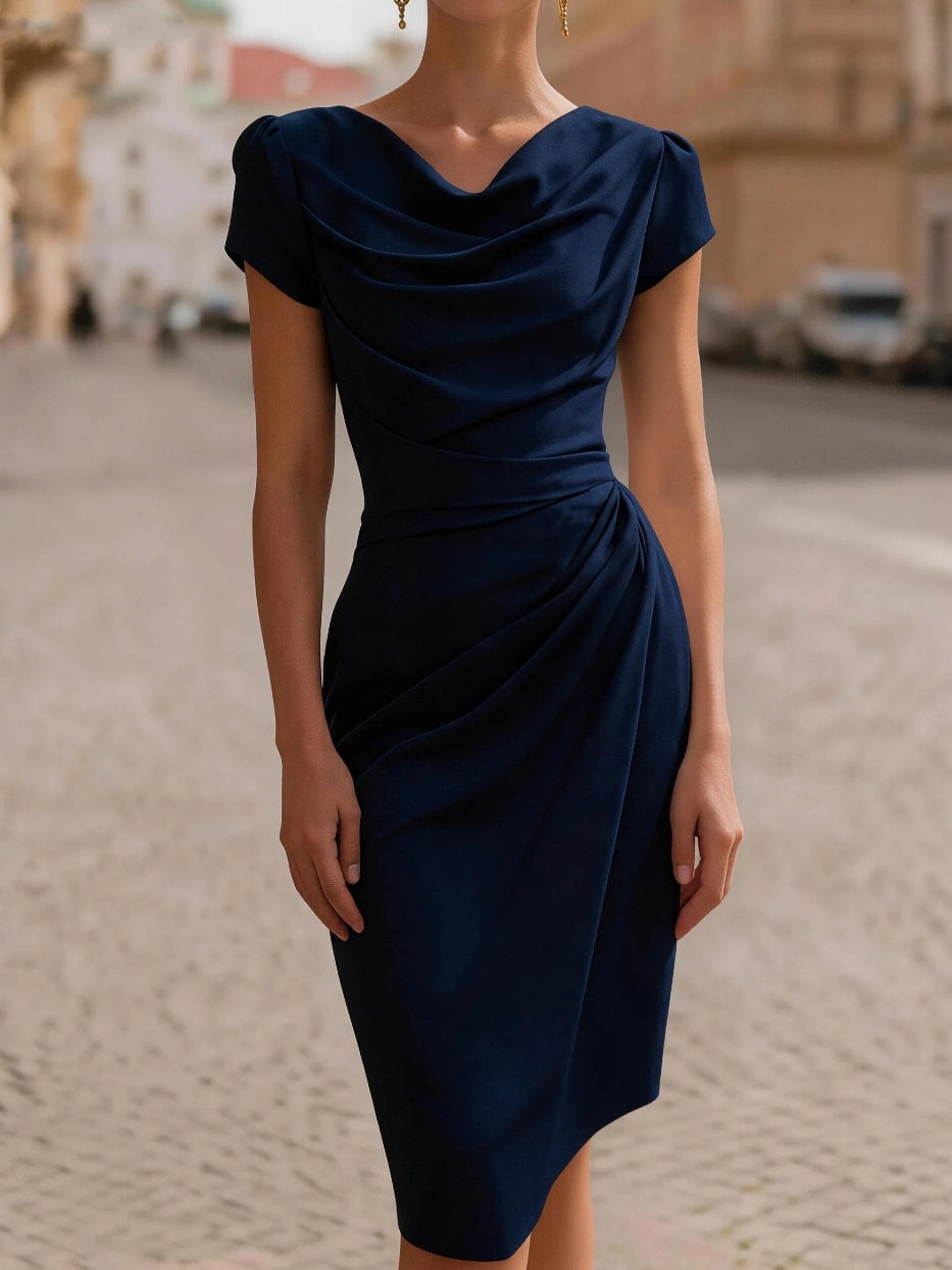 A Midi Dress With A Ruffled Neckline And A Fitted, Bodycon Silhouette.