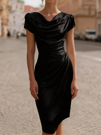 A Midi Dress With A Ruffled Neckline And A Fitted, Bodycon Silhouette.