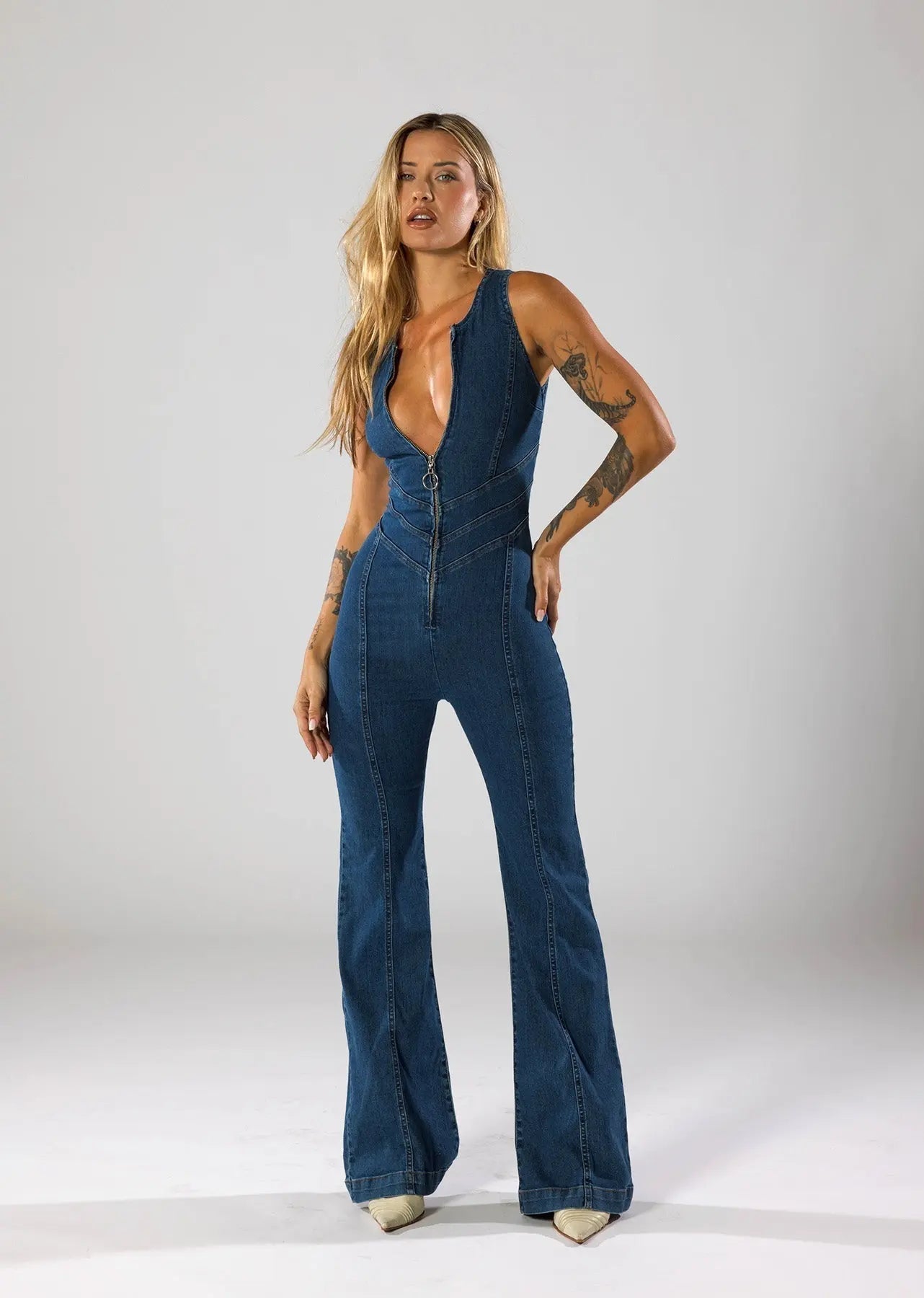 | Fitted Denim Jumpsuit with Plunge Neck and Flared Legs