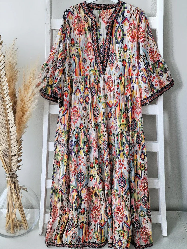 V Neck Bell Sleeve Ikat Print Tiered Midi Dress
