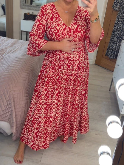 Deep V Neck Bell Sleeve Smocked Waist Tiered Ikat Print Maxi Dress