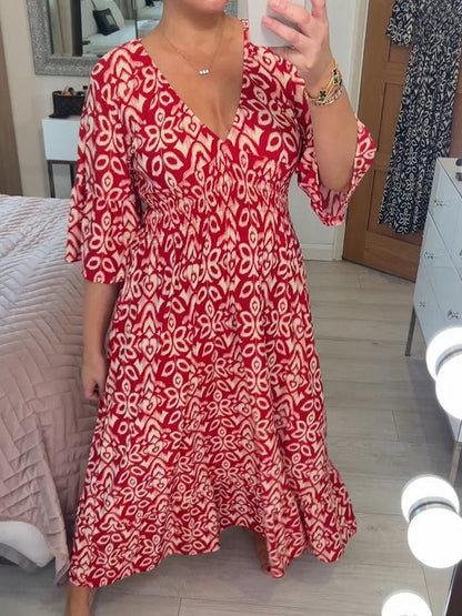 Deep V Neck Bell Sleeve Smocked Waist Tiered Ikat Print Maxi Dress