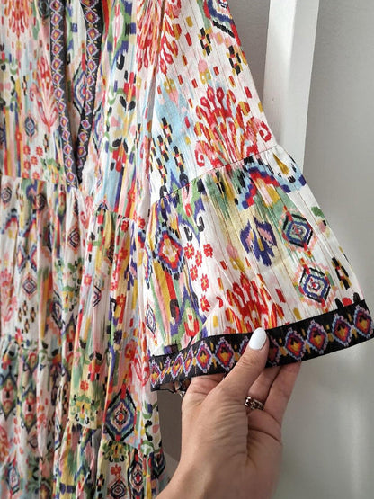 V Neck Bell Sleeve Ikat Print Tiered Midi Dress