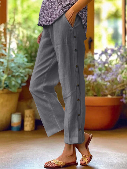 Breathable Cotton And Linen Cropped Trousers With Decorative Side Seams, Side Pockets, And A High Waist.