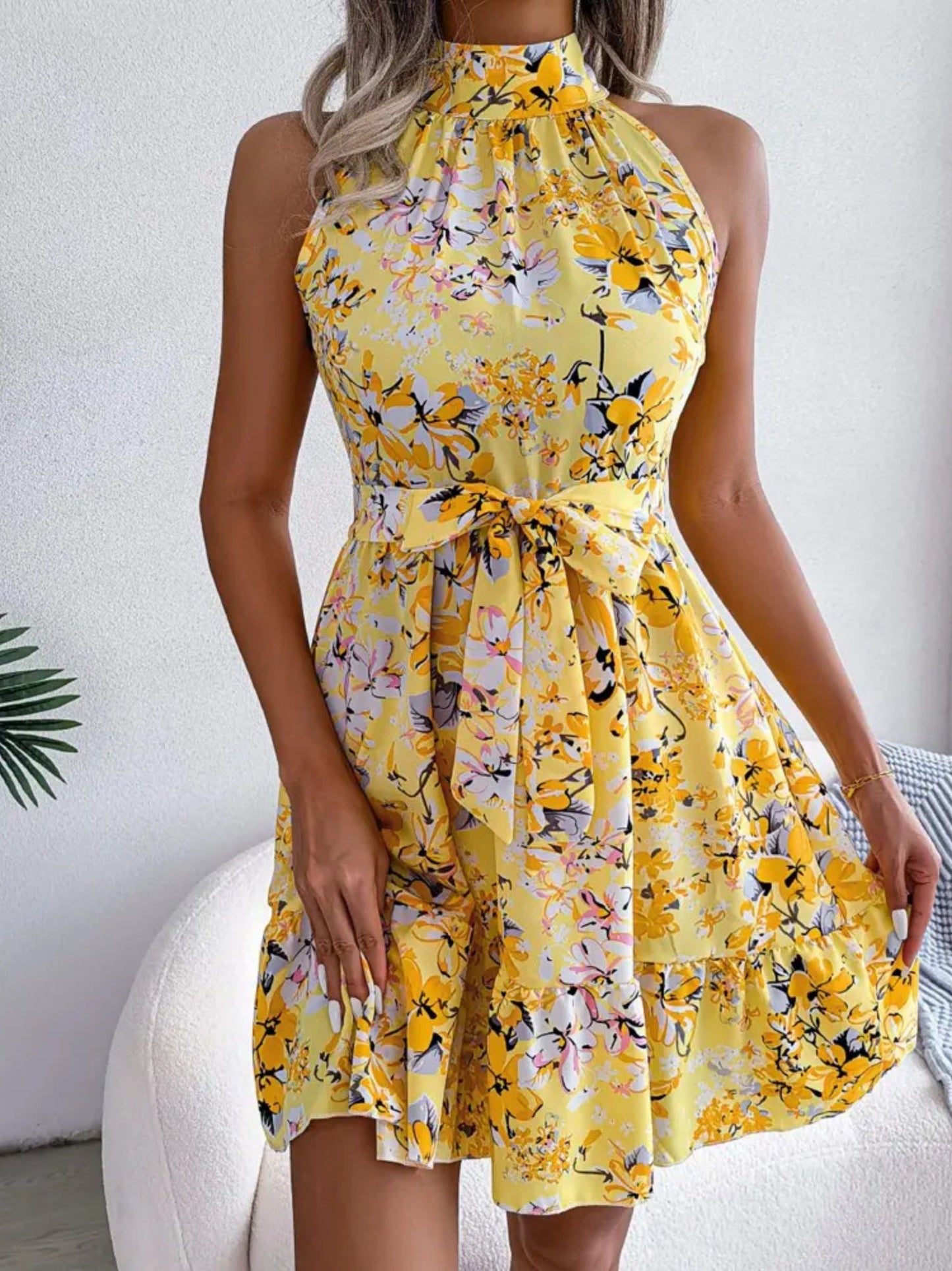 Printed Sleeveless Tie Mini Dress With A Full Skirt