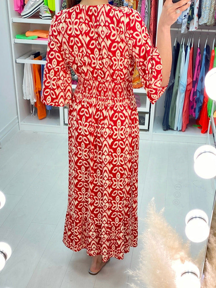 Deep V Neck Bell Sleeve Smocked Waist Tiered Ikat Print Maxi Dress