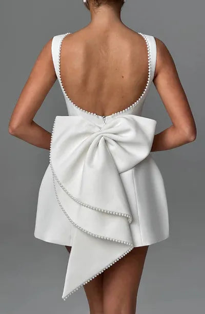 Pearl Trim Boat Neck Box Pleat Back Bow A-Line Mini Dress