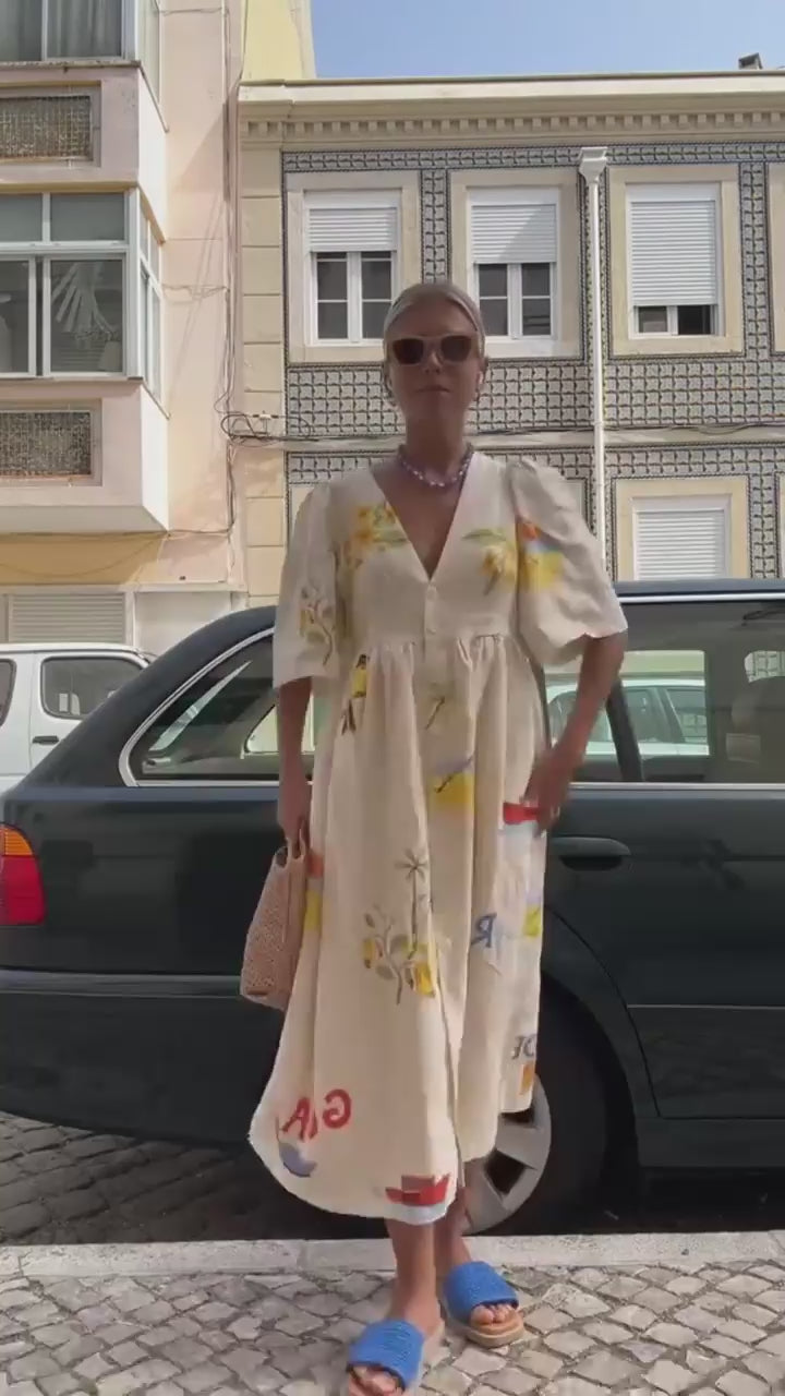 Deep V-Neck Puff Sleeve Button Front Tropical Print Midi Dress