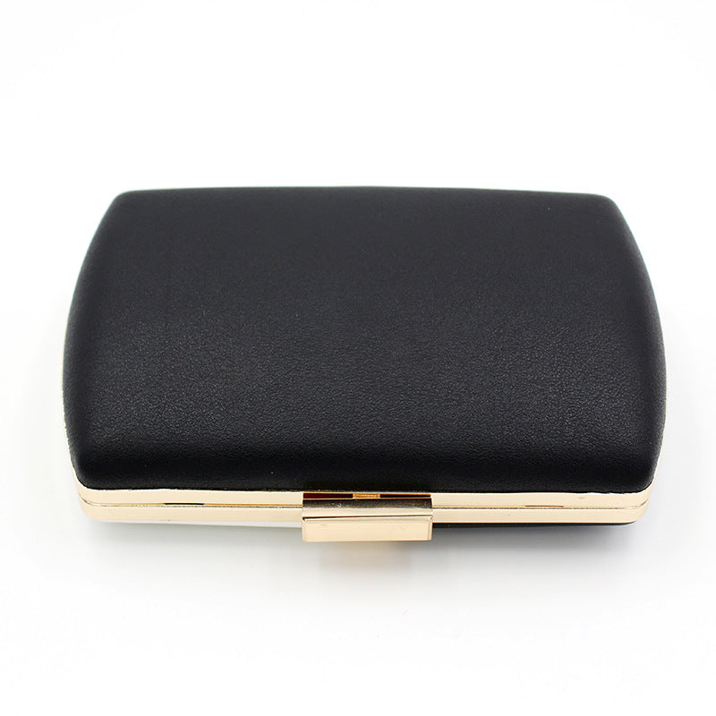 Cheryl Gold Clutch Bag