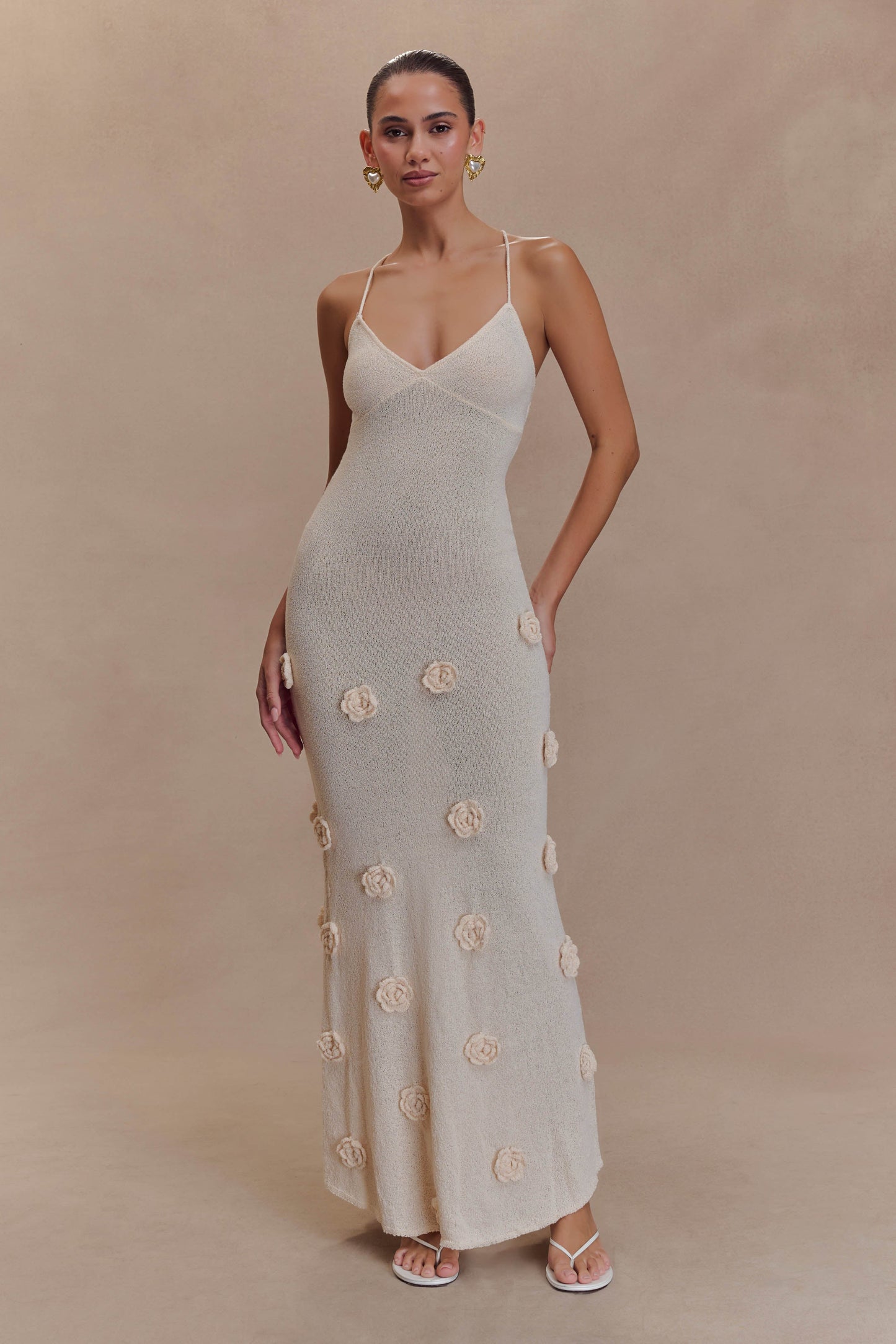 | Knitted slip dress with rosette detail