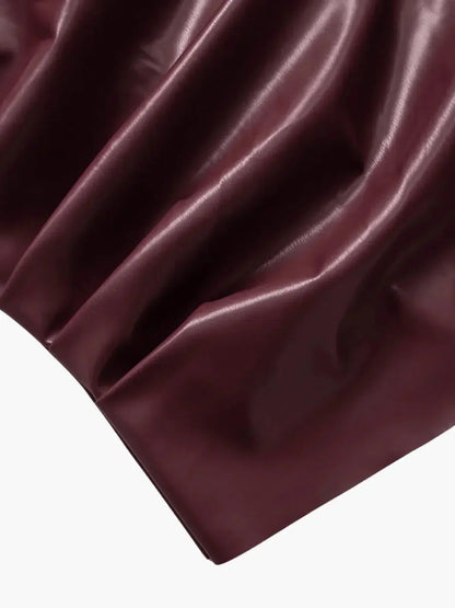 | Asymmetrical Hemline Faux Leather Top