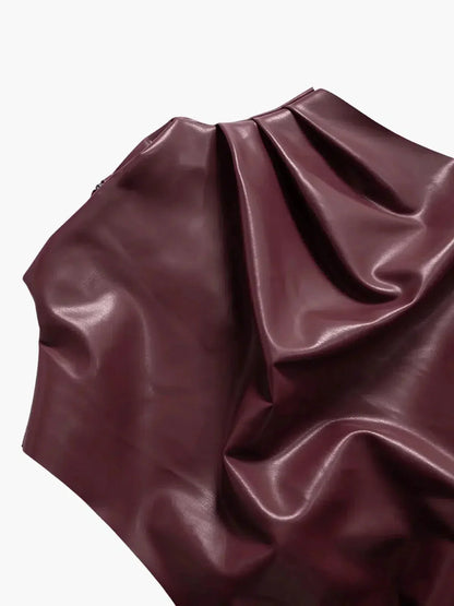 | Asymmetrical Hemline Faux Leather Top
