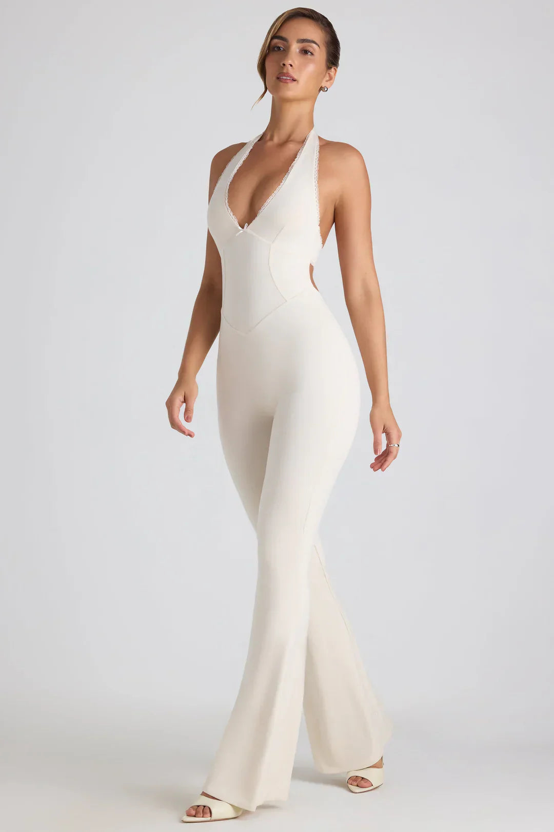 Elegant Black Jumpsuit for Women with Open Back and Halter Neck – Flattering Bodycon Fit for Special Occasions