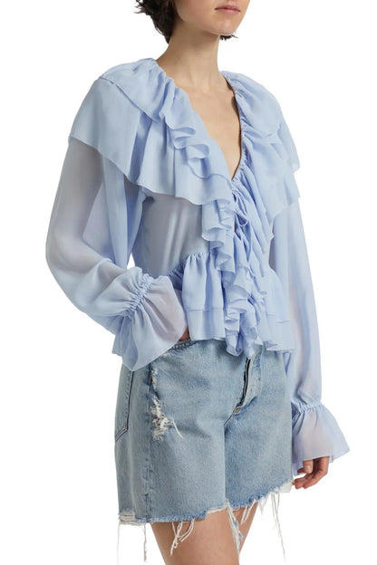 | Sheer chiffon blouse with cascading ruffles