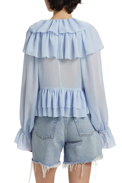 | Sheer chiffon blouse with cascading ruffles