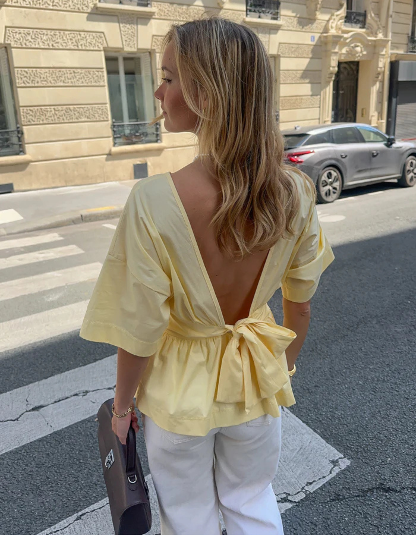 | Open-back peplum blouse