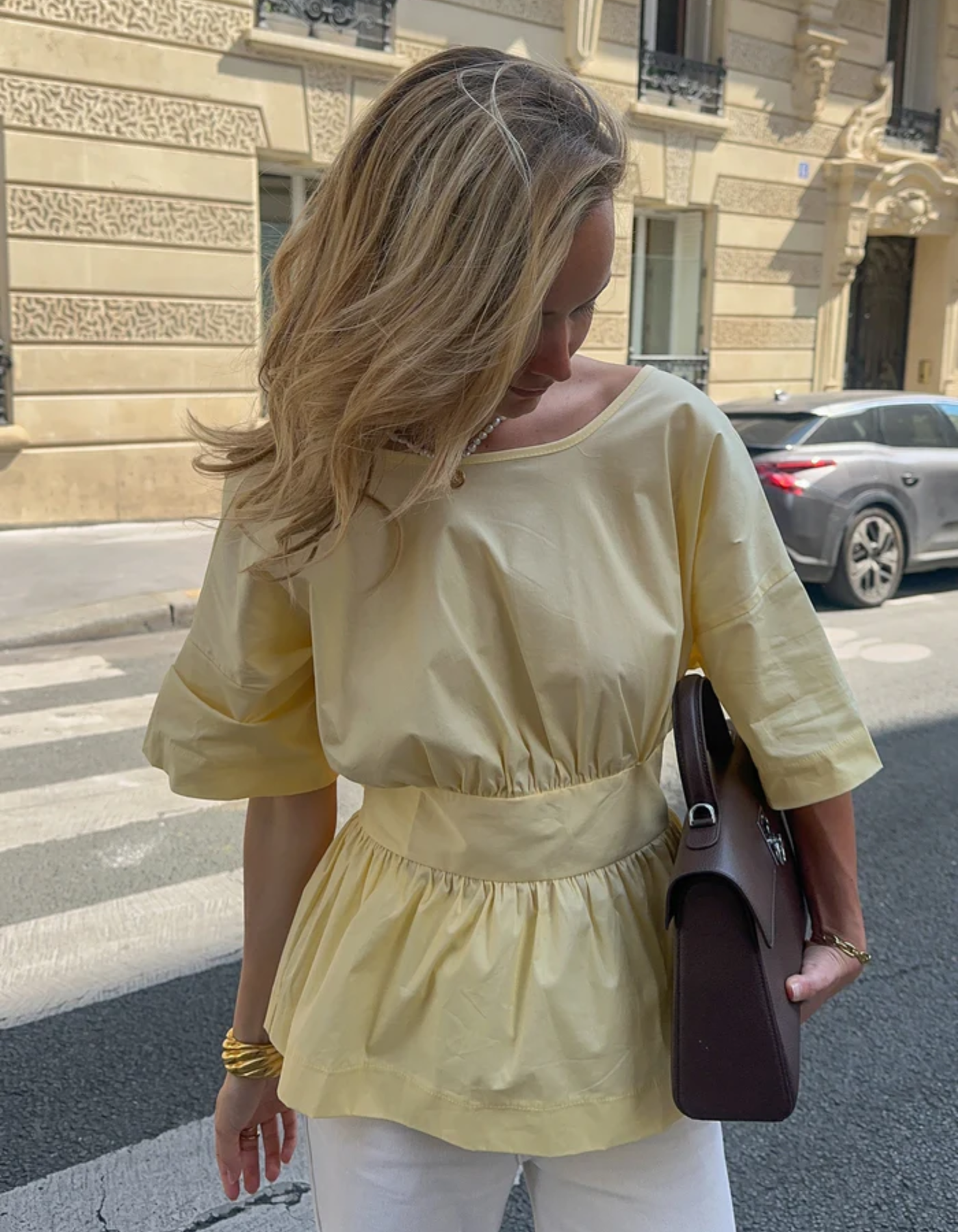 | Open-back peplum blouse