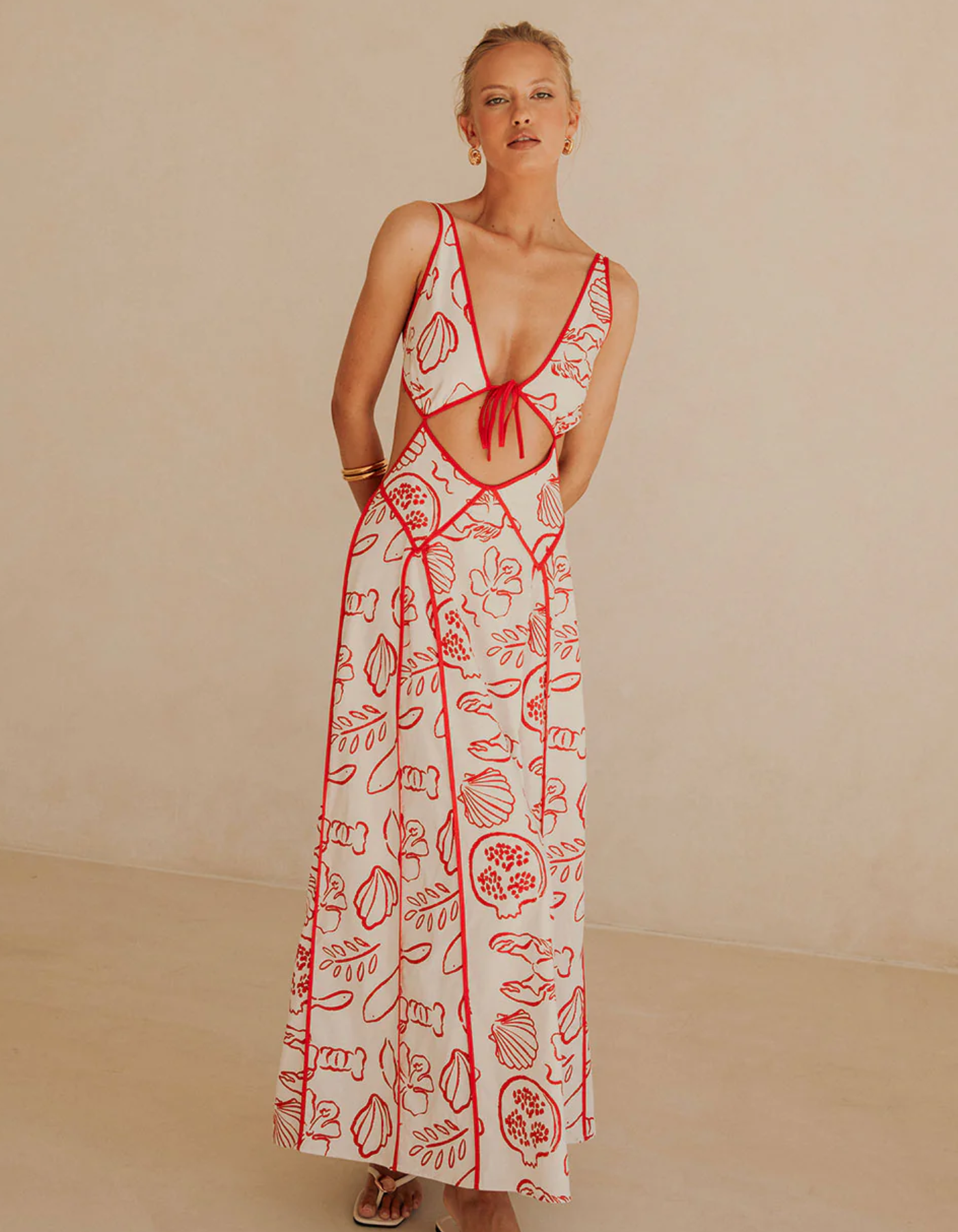 | Printed sundress with coastal cut-out design
