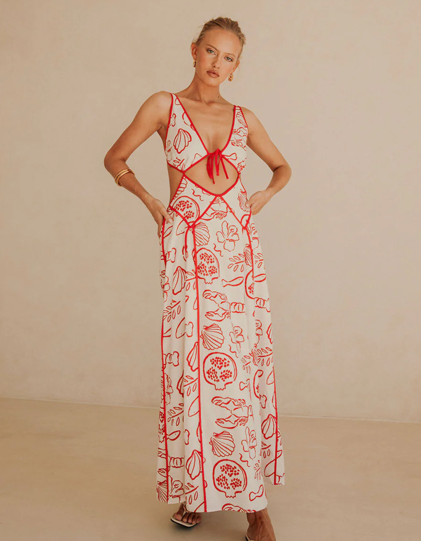 | Printed sundress with coastal cut-out design
