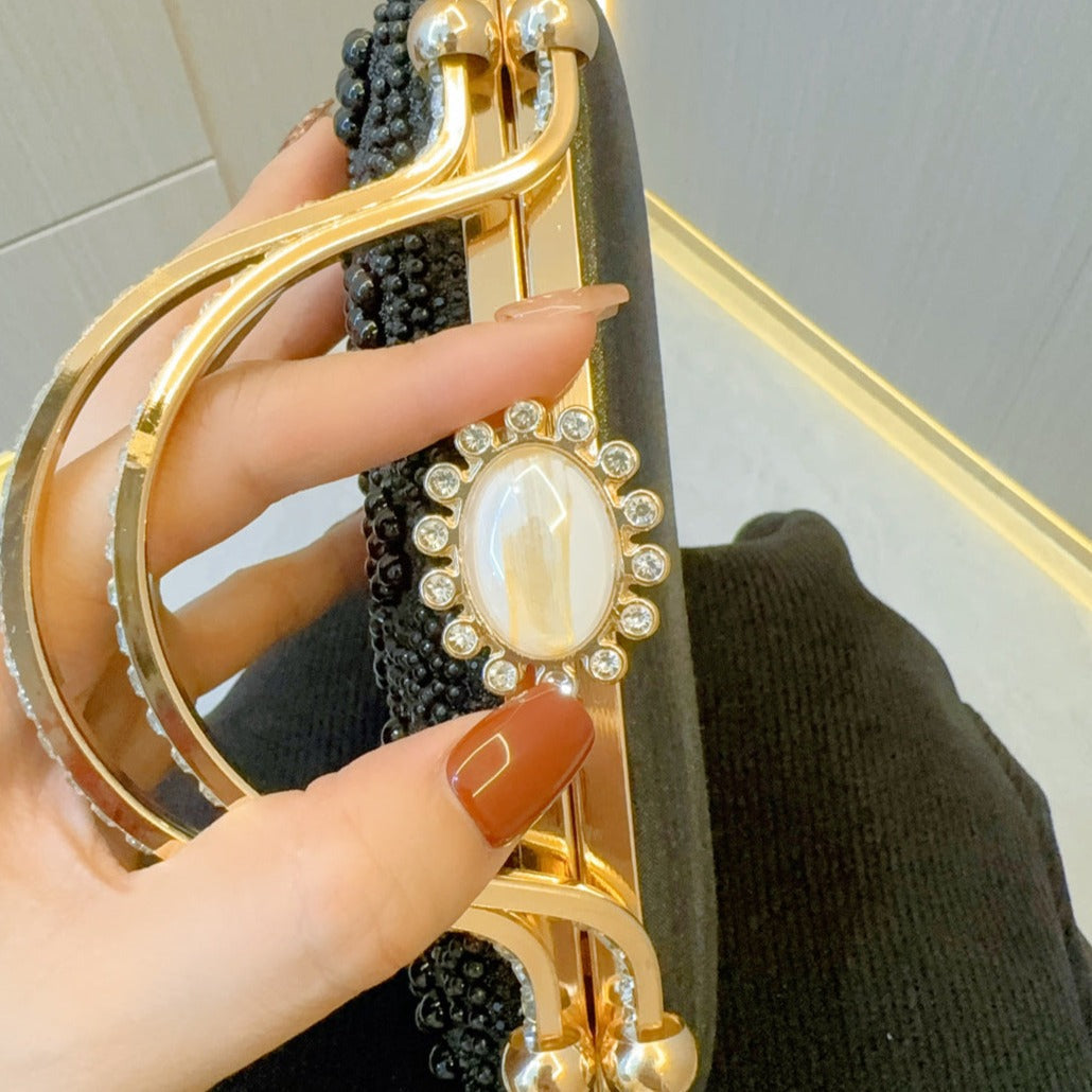 Pearl Clutch Bag by Clarabelle