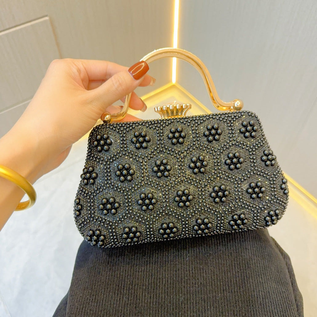 Pearl Clutch Bag by Clarabelle