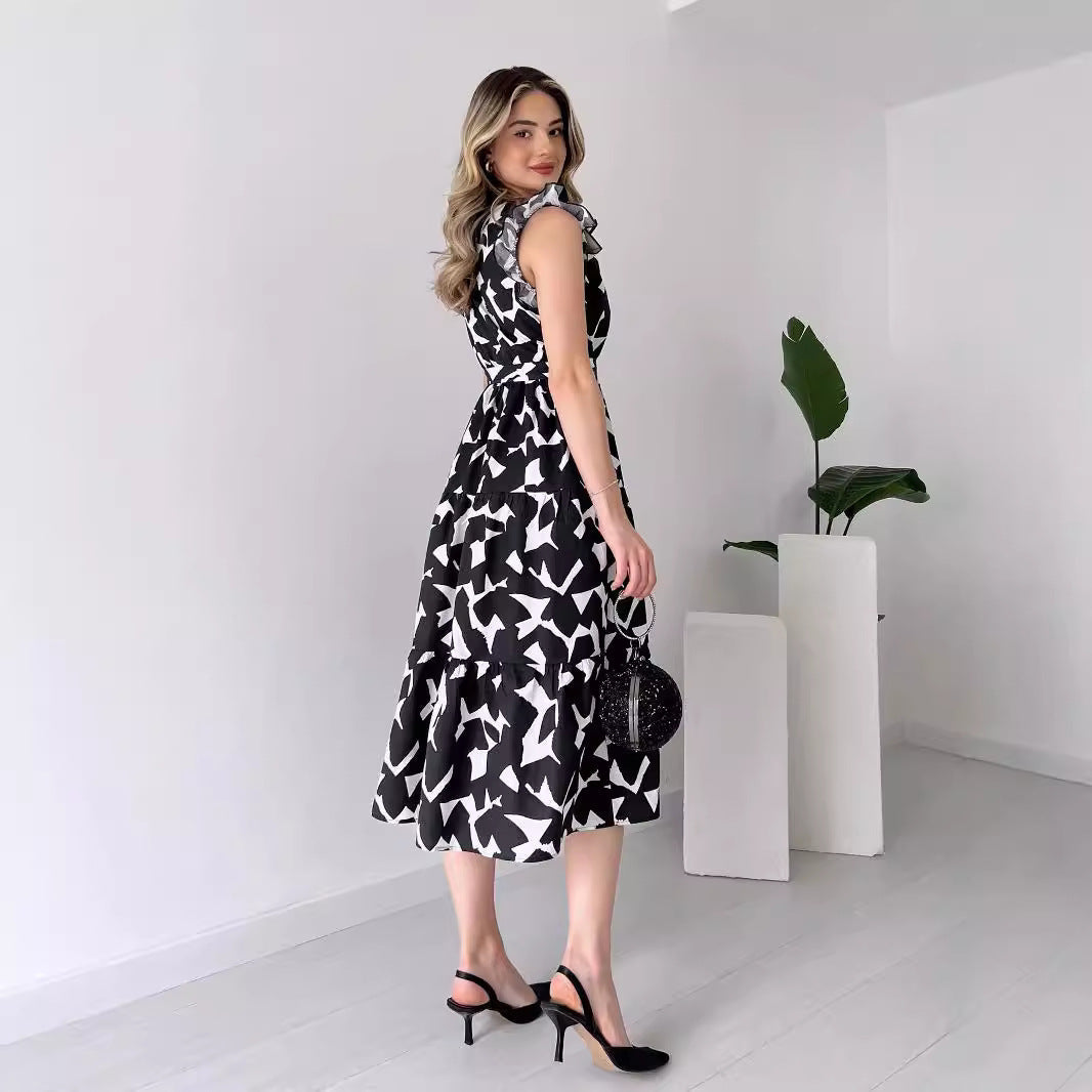 Deep V-Neck Flutter Sleeve Tie Waist Tiered Abstract Geo Print Wrap Midi Dress
