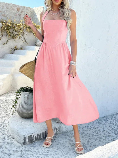 Sleeveless Pink Maxi Dress with Halter Neckline and Backless Design