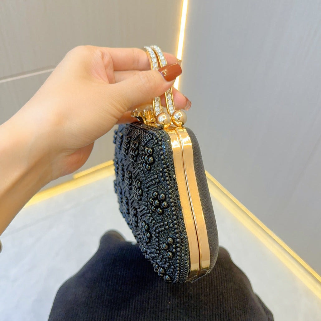 Pearl Clutch Bag by Clarabelle