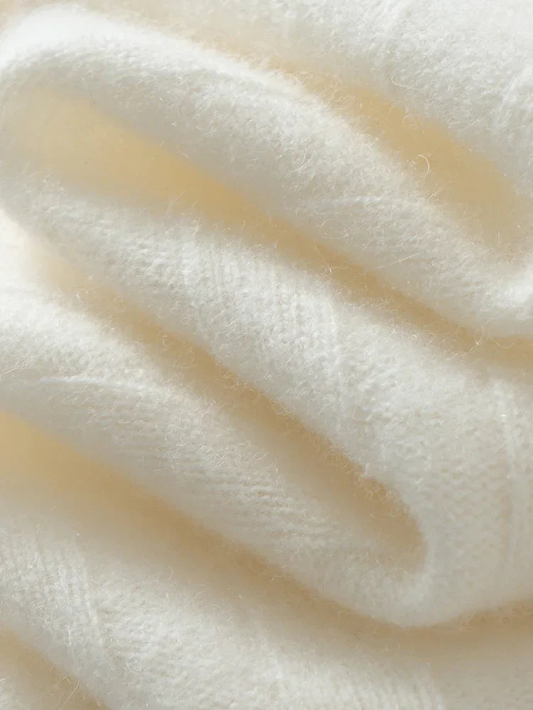 | Buttoned Cashmere Sweater