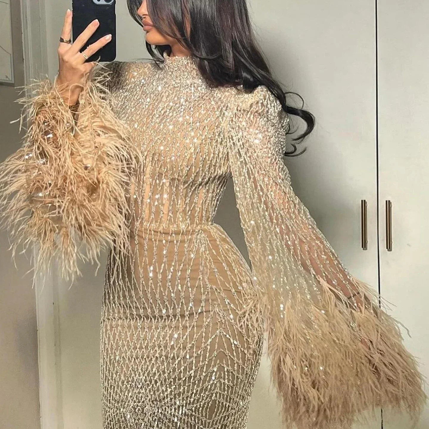 Feather Embellished Evening Gown with Long Sleeves