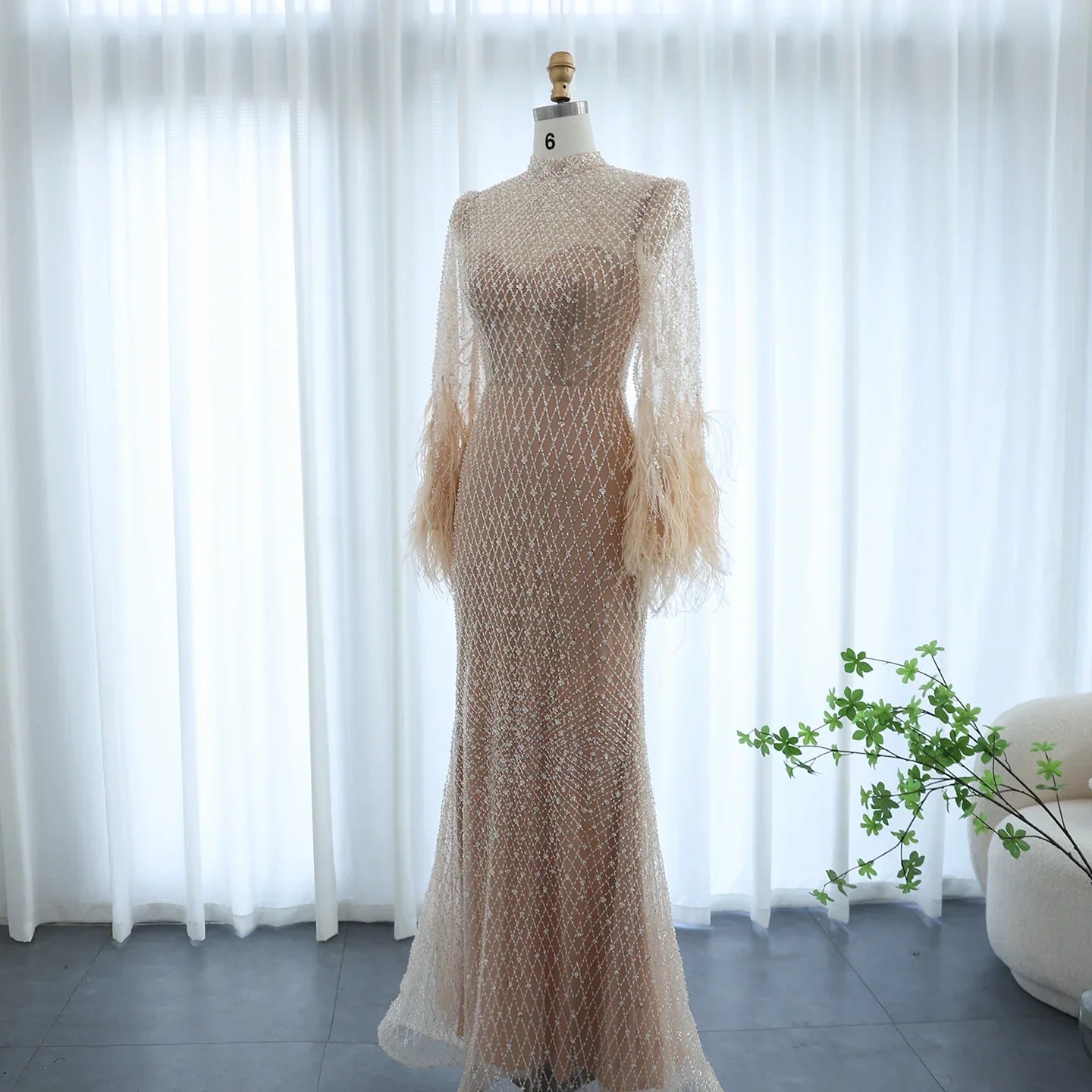 Feather Embellished Evening Gown with Long Sleeves