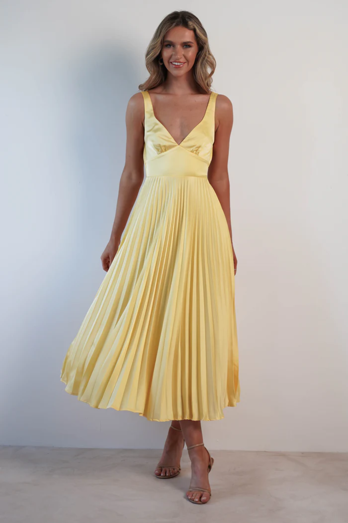 | Pleated Flow Sleeveless Midi Dress