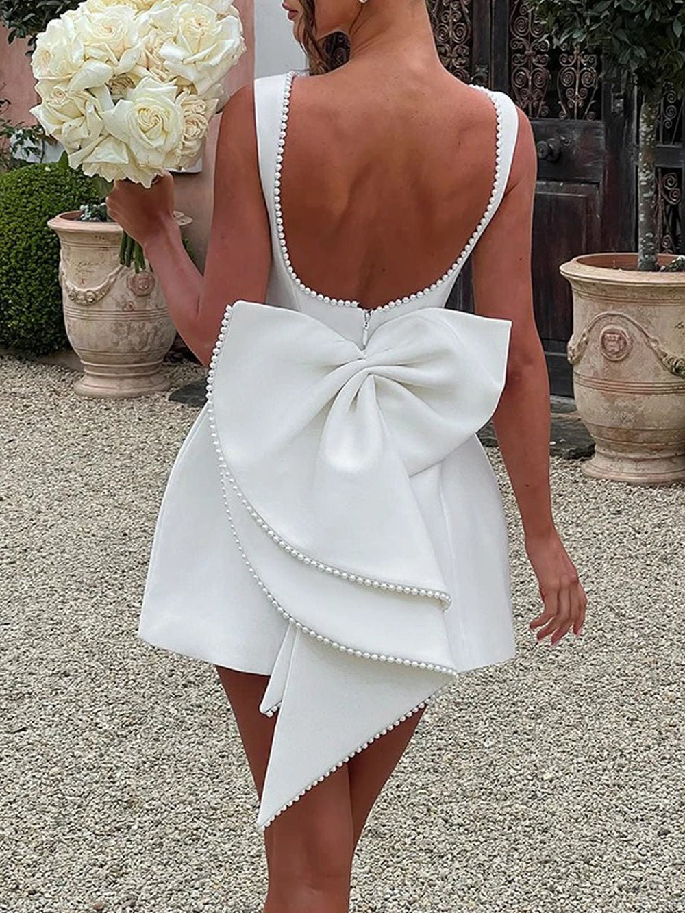 Sleeveless Pearl Trim Oversized Bow Back Mini Dress