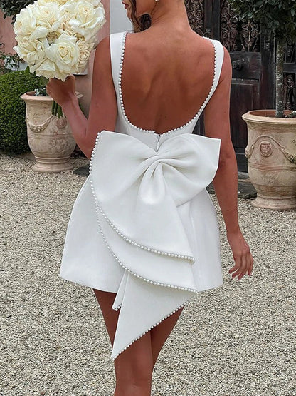 Sleeveless Pearl Trim Oversized Bow Back Mini Dress