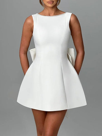 Sleeveless Pearl Trim Oversized Bow Back Mini Dress