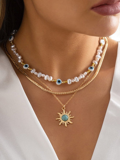 Turquoise and Pearl Layered Necklace with Bohemian Sunburst 디자인