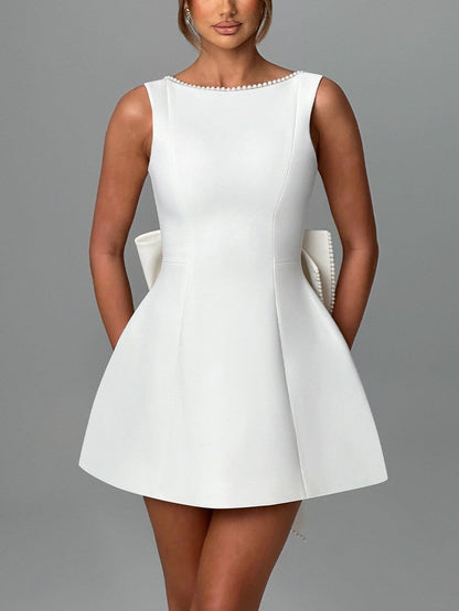 Elegant Pearl Bow Fitted Mini Dress