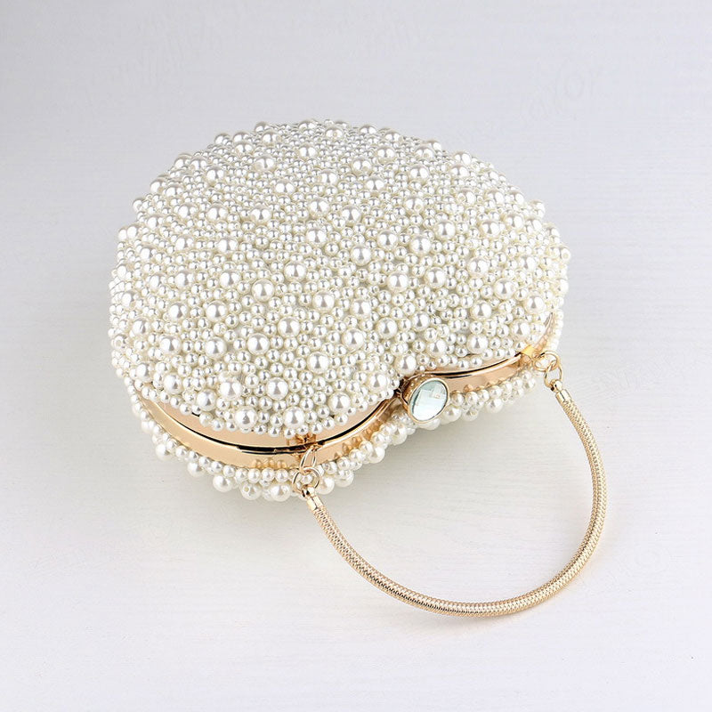 Beige Heart Shaped Clutch Bag with Luxury Metal Handle and Pearl Beads