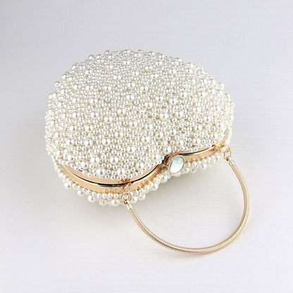 Beige Heart Shaped Clutch Bag with Luxury Metal Handle and Pearl Beads
