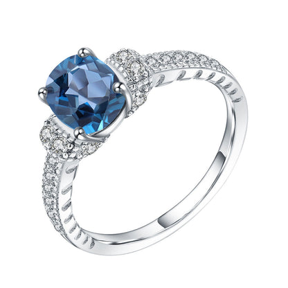 Cubic Zirconia and London Blue Topaz Halo Ring