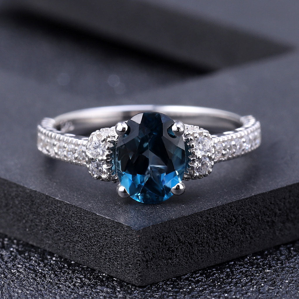 Cubic Zirconia and London Blue Topaz Halo Ring
