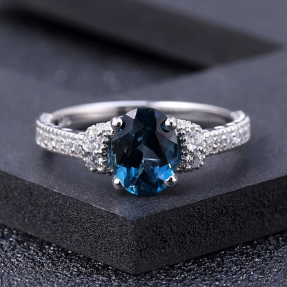 Cubic Zirconia and London Blue Topaz Halo Ring