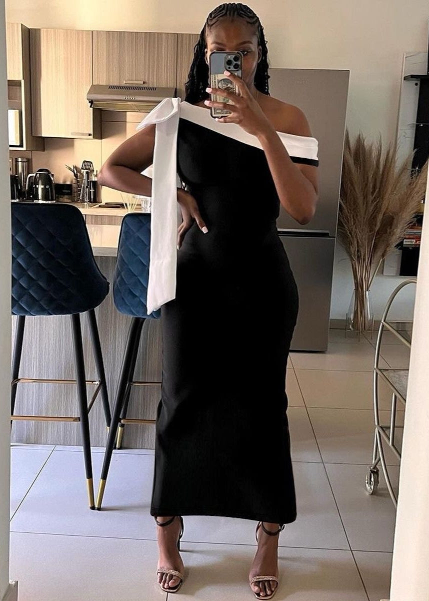 Off-Shoulder Black Maxi Dress with White Bow Detail