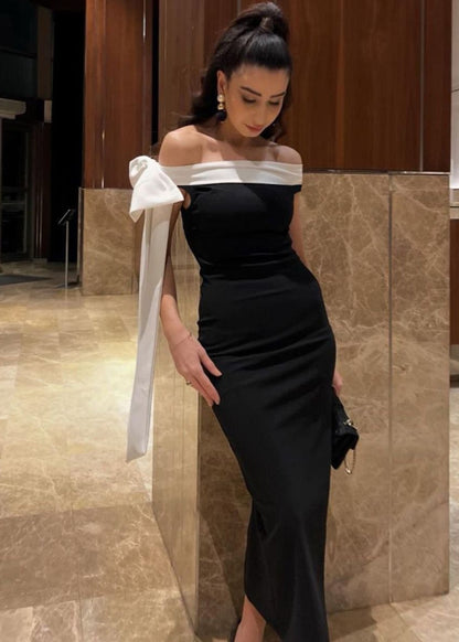 Off-Shoulder Black Maxi Dress with White Bow Detail