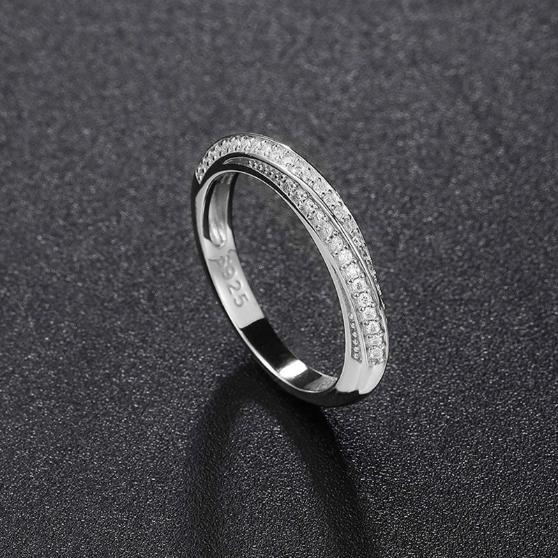 Rhodium Plated Sterling Silver Twisted Ring with Round Cut Moissanite Pave