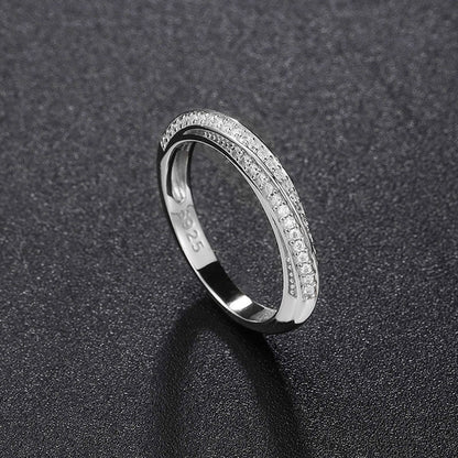 Rhodium Plated Sterling Silver Twisted Ring with Round Cut Moissanite Pave