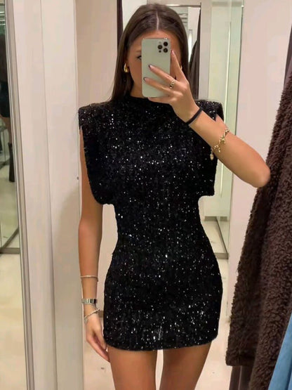 | Black Glitter Mini Dress - Structured Shoulder Silhouette